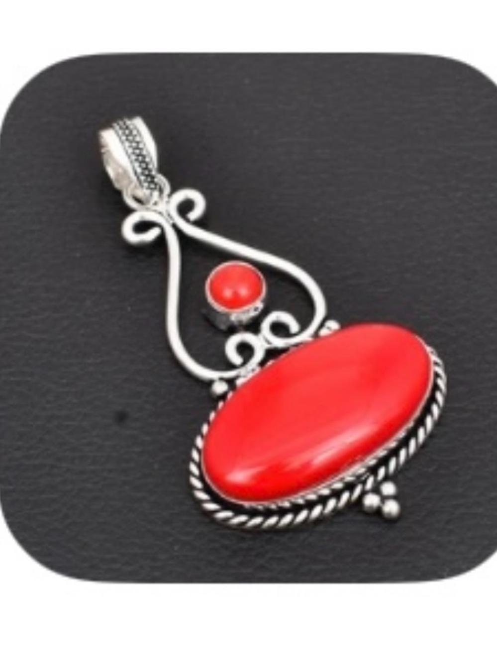 Beautiful, 925 marked, Coral pendant on a silver chain.
